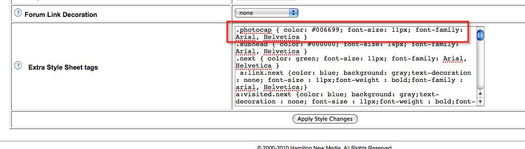 How do I change the style (font, color, ect.) for my photo captions?
